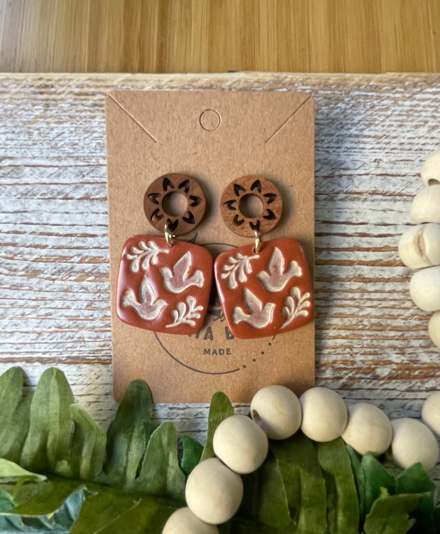 Terra Cotta Bird Dangle on Wood Stud