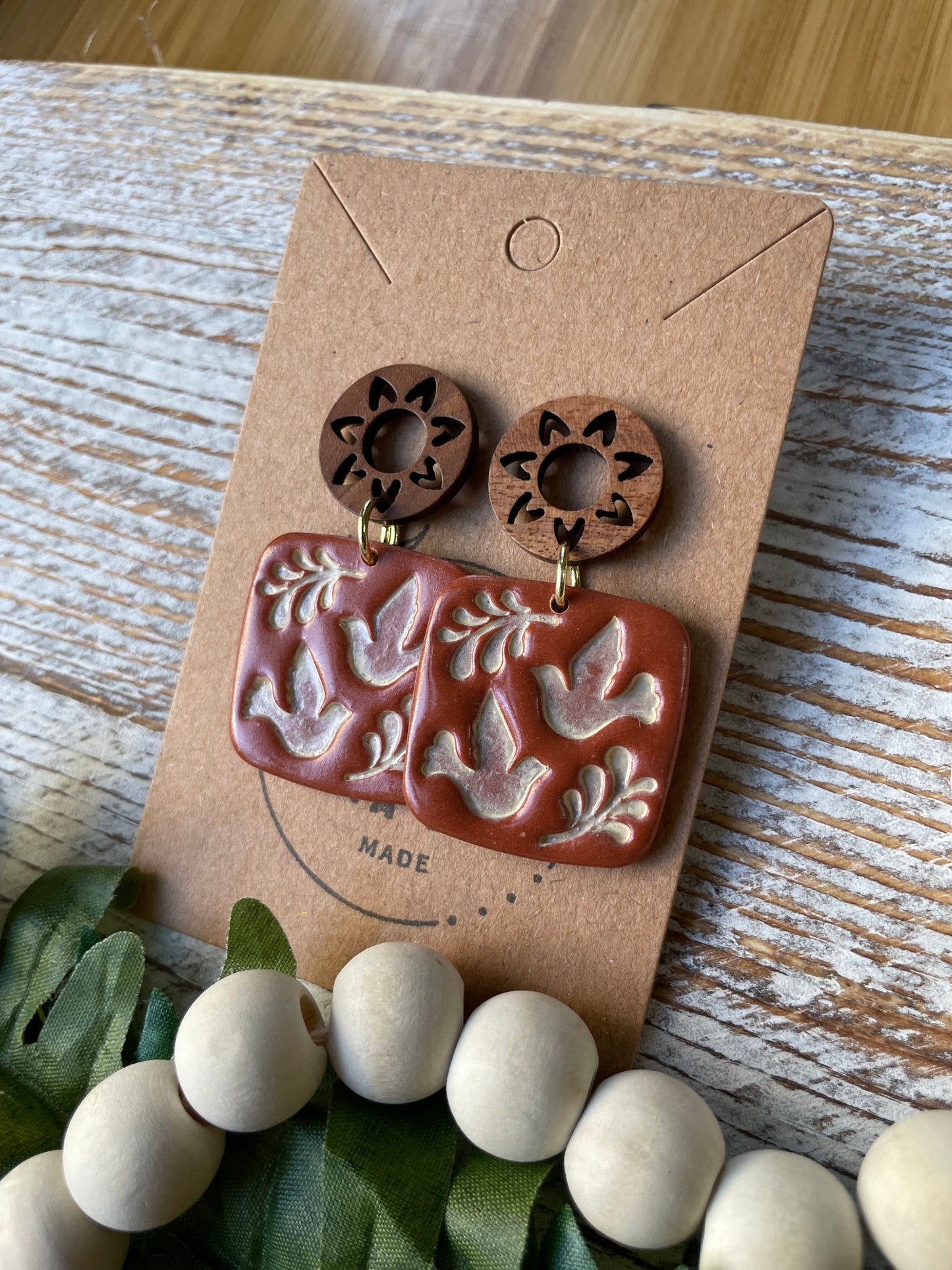 Terra Cotta Bird Dangle on Wood Stud